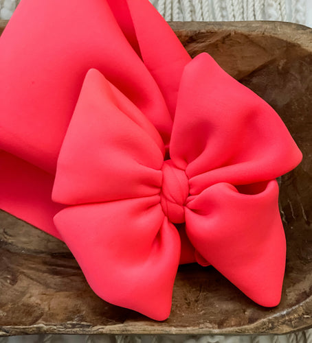 Neon coral scuba bow